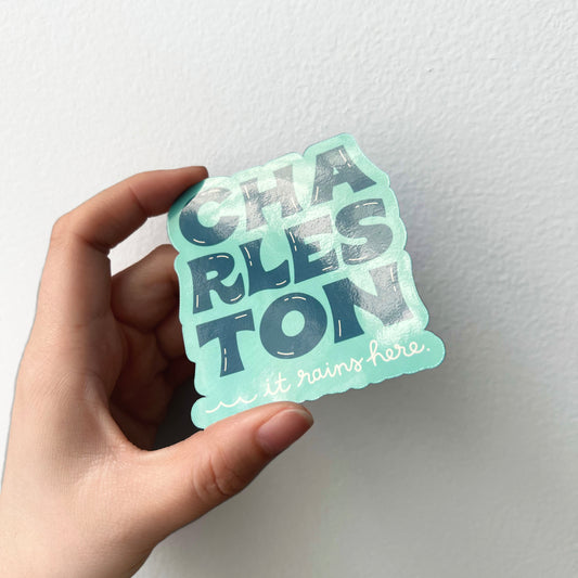 charleston — it rains here glossy vinyl sticker